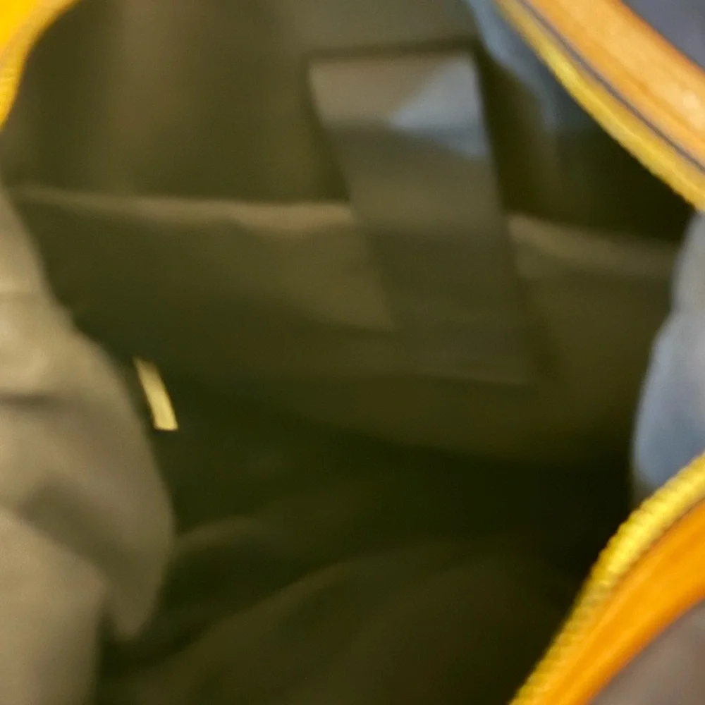 Tommy Bahama Black and Tan Backpack